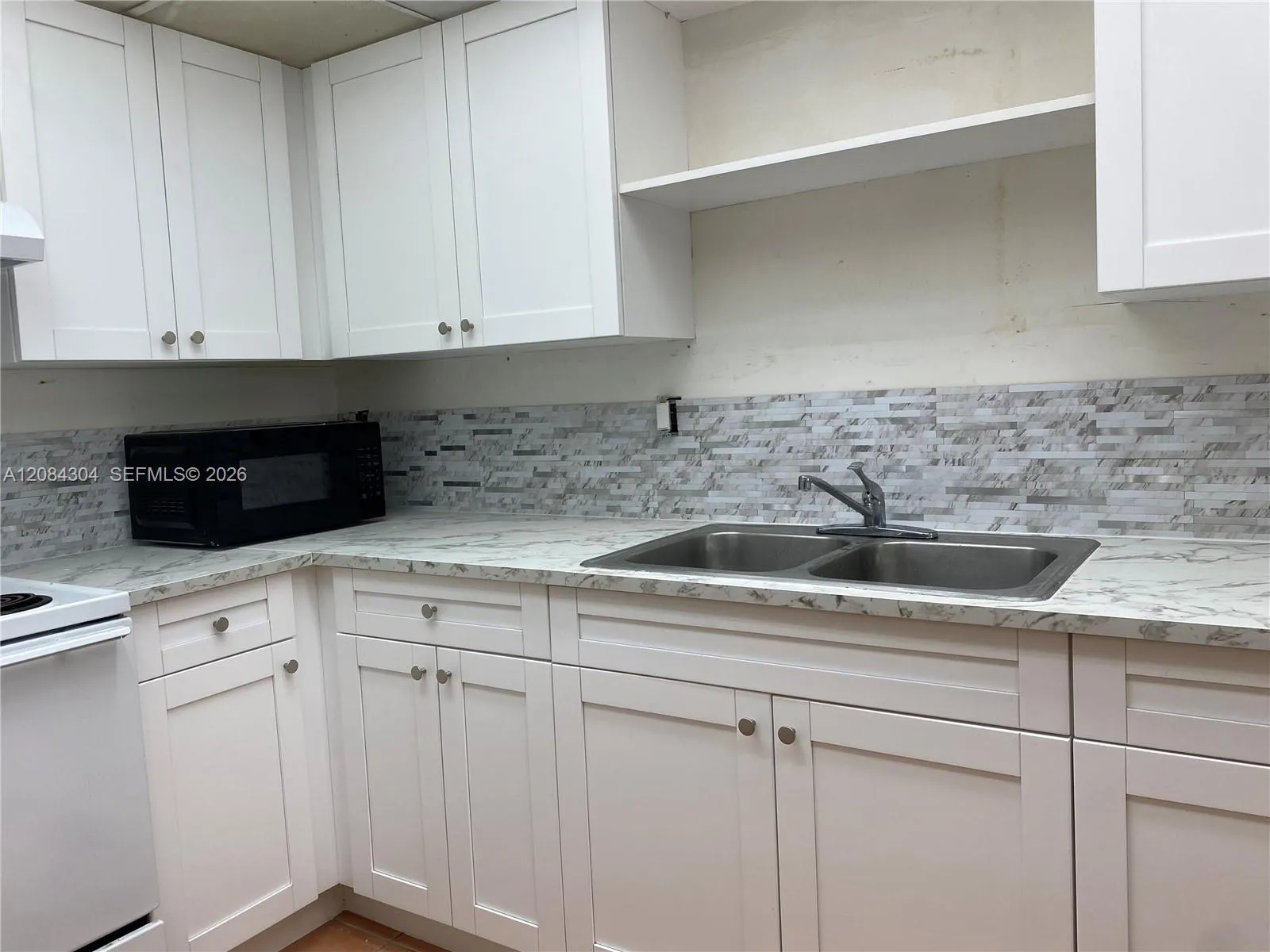 View details of listing 10000 NW 80 Court 2537, Hialeah Gardens, FL 33016 Hialeah Gardens with MLS# 