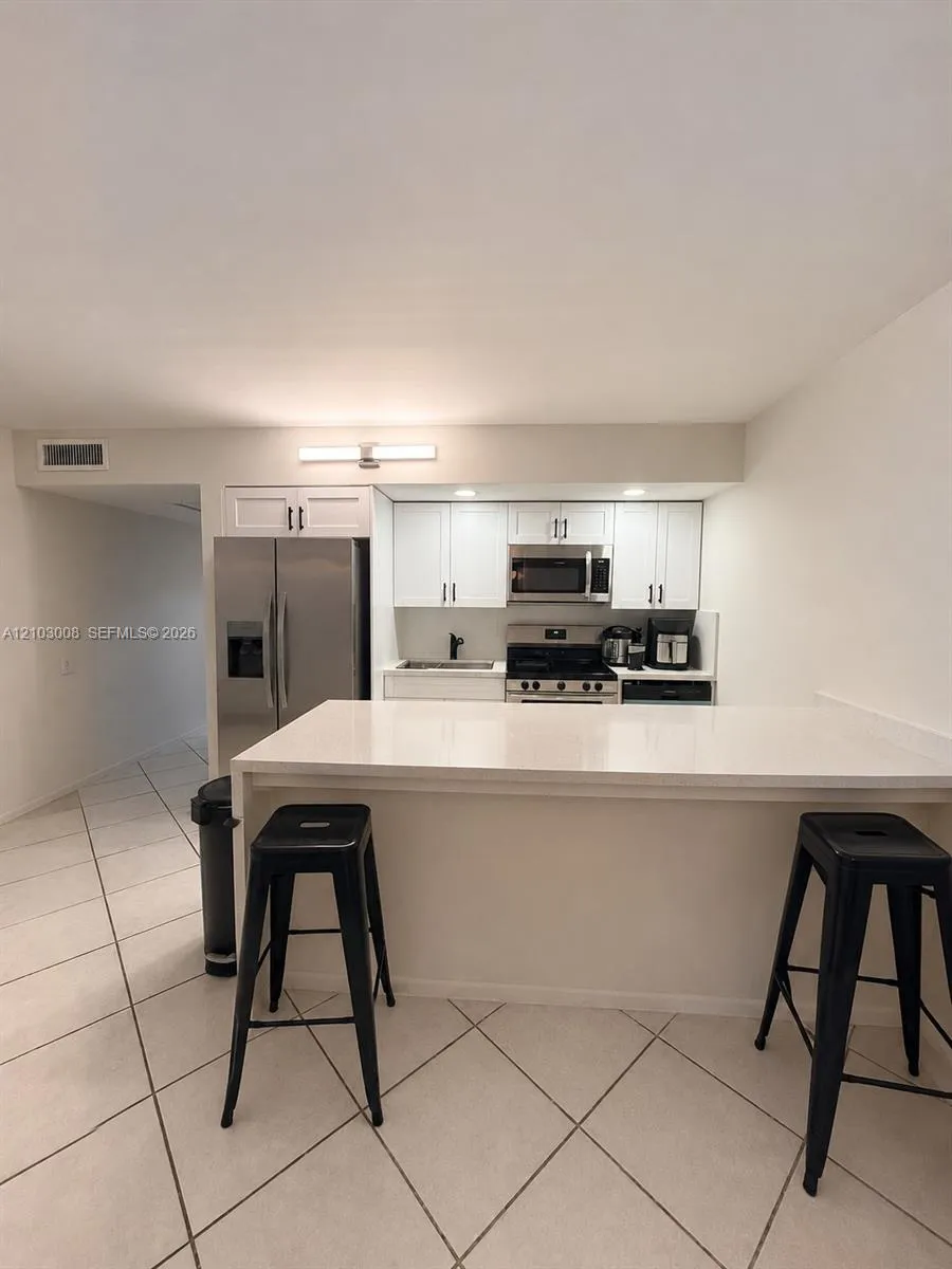 View details of listing 1207 Bahama Bend E1, Coconut Creek, FL 33066 Coconut Creek with MLS#