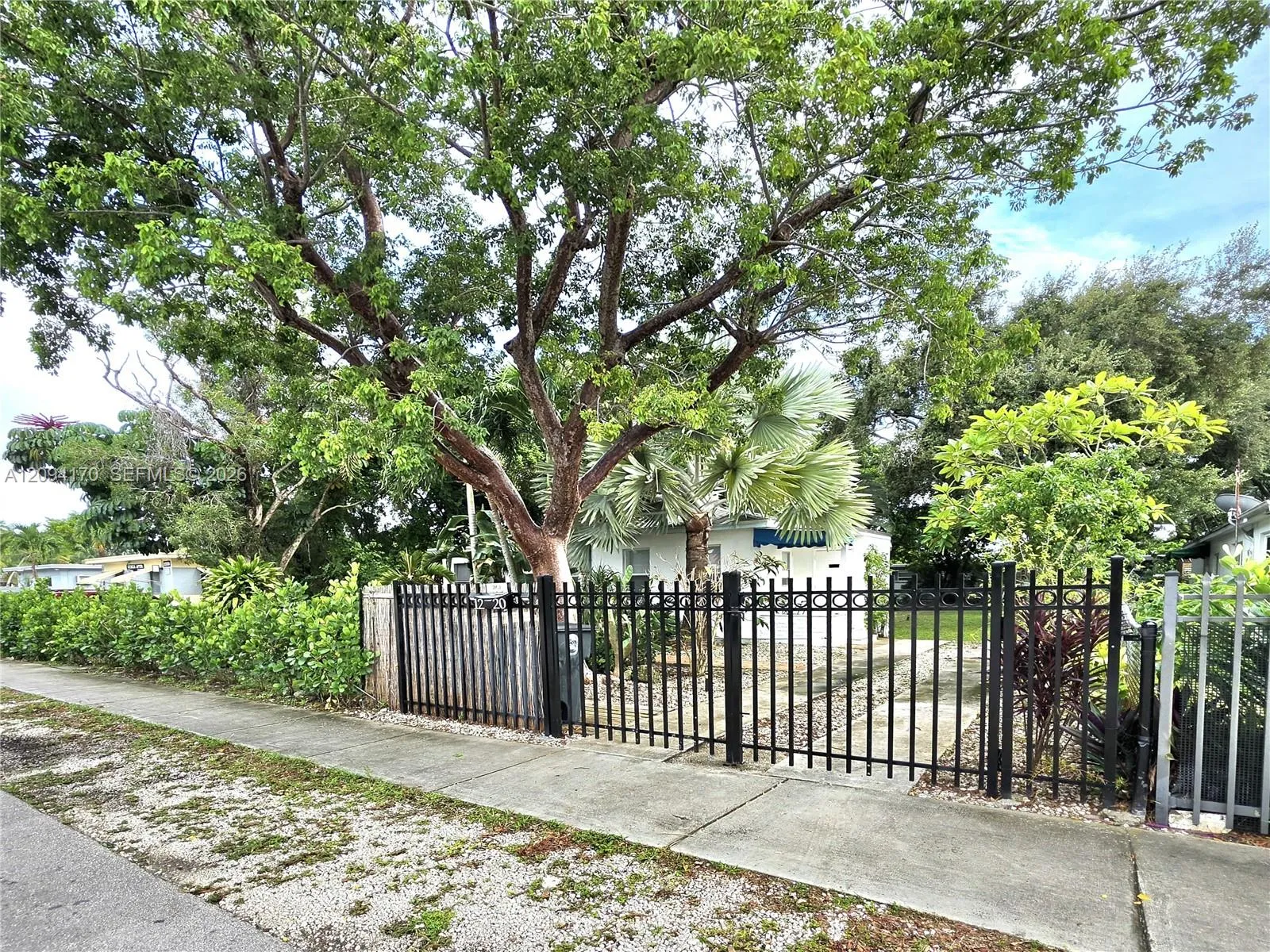 View details of listing 1220 NE 128th Street, North Miami, FL 33161 North Miami with MLS#