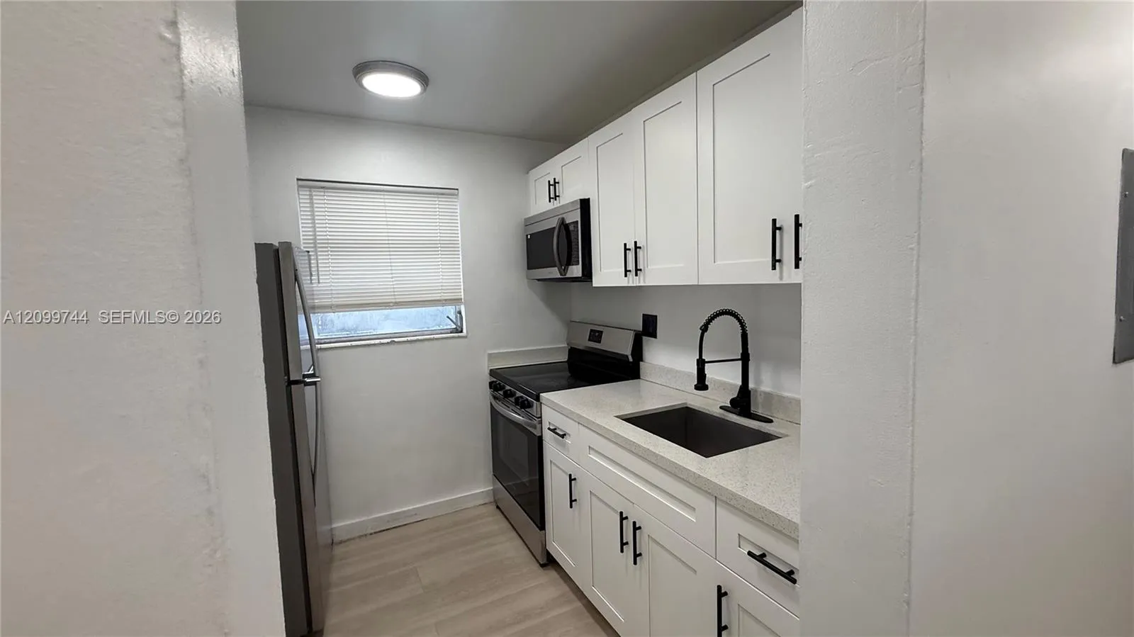 View details of listing 12215 W Dixie Highway 308, North Miami, FL 33161 North Miami with MLS#