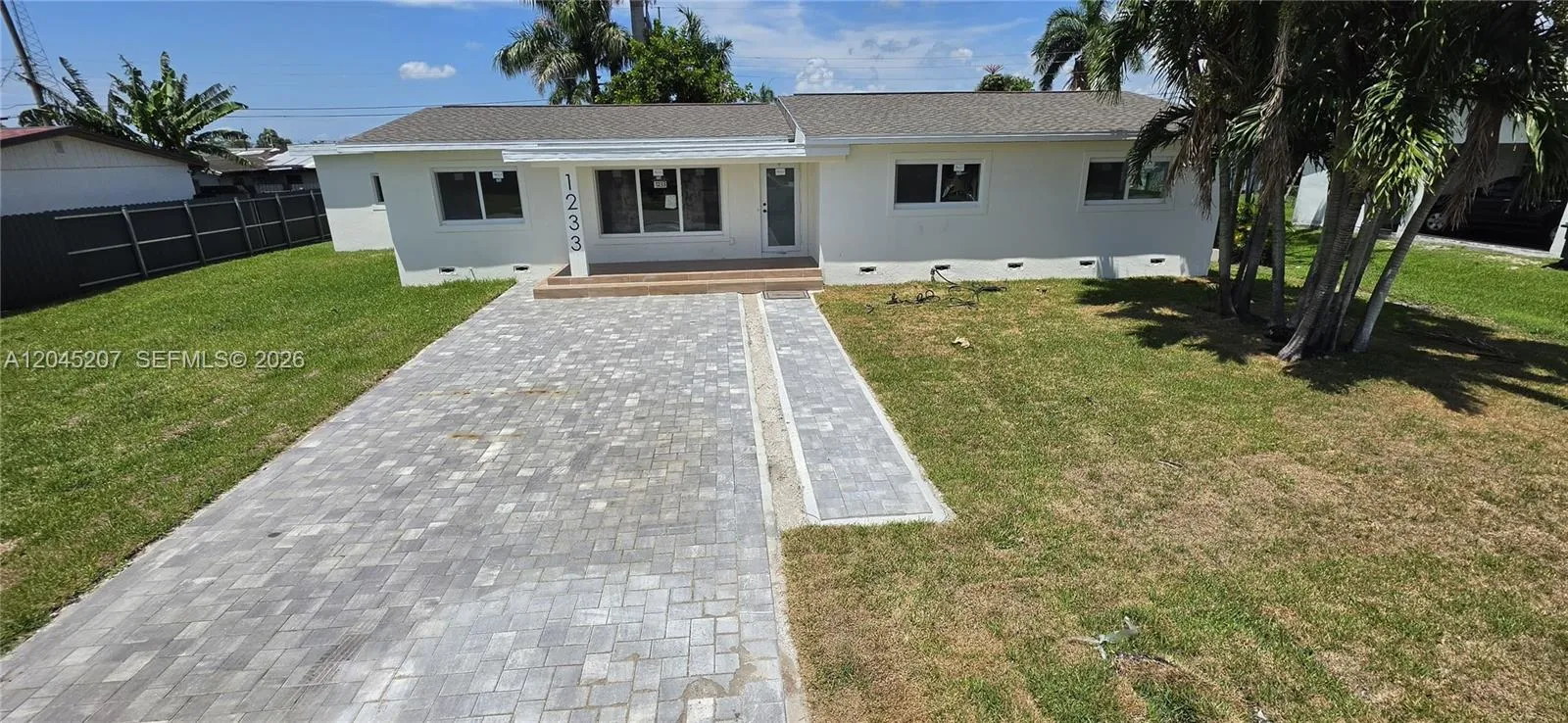 View details of listing 1233 SW Avenue C Place, Belle Glade, FL 33430 Belle Glade with MLS#