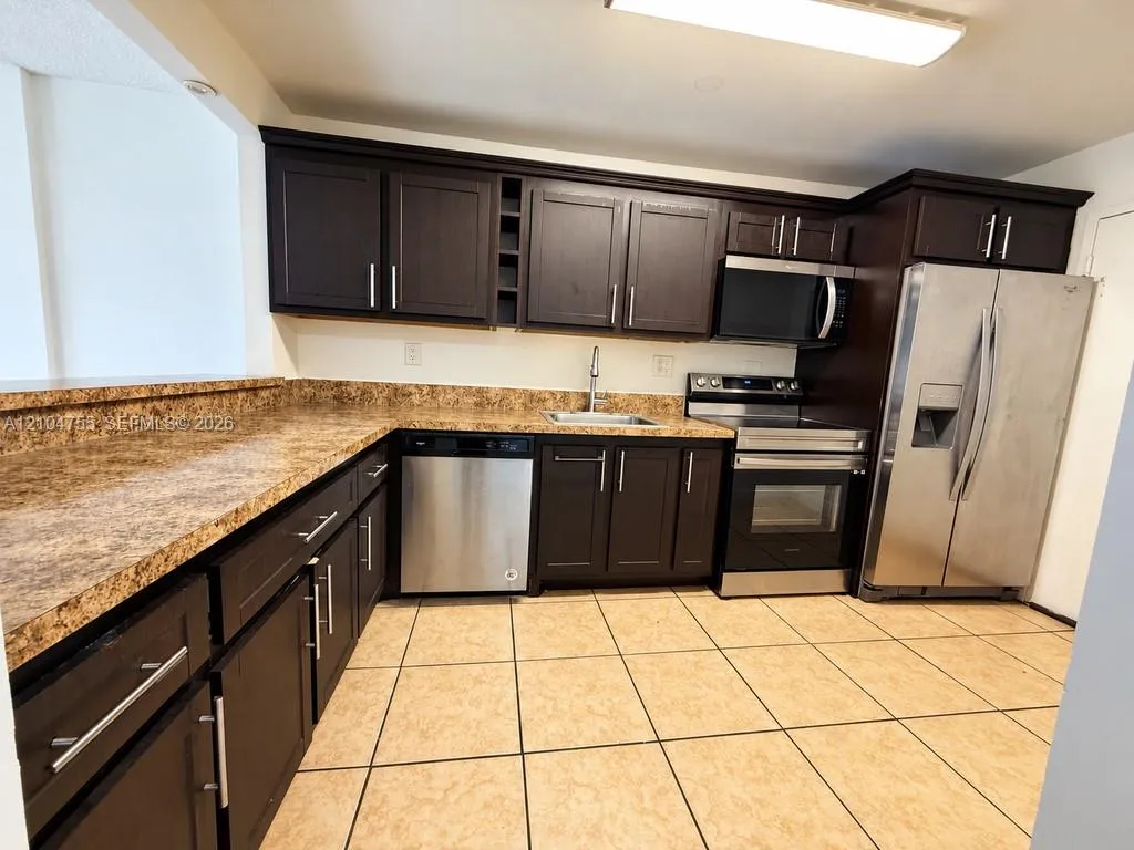 View details of listing 1465 NE 123rd Street 205, North Miami, FL 33161 North Miami with MLS#