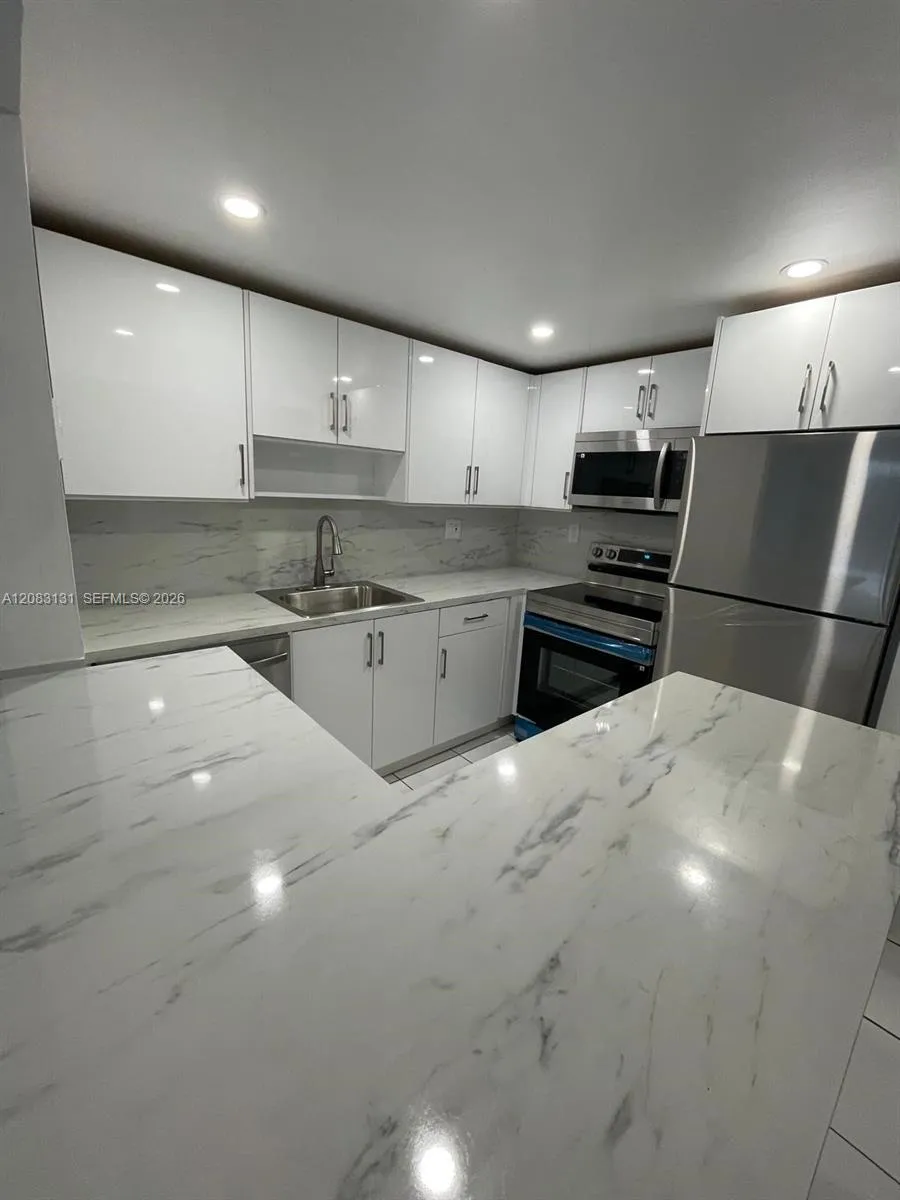 View details of listing 1465 NE 123rd Street 412, North Miami, FL 33161 North Miami with MLS#