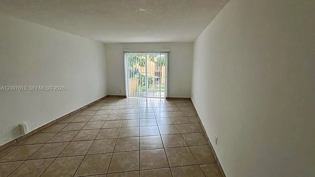 View details of listing 18111 NW 68th Avenue H205, Hialeah, FL 33015 Hialeah with MLS# 