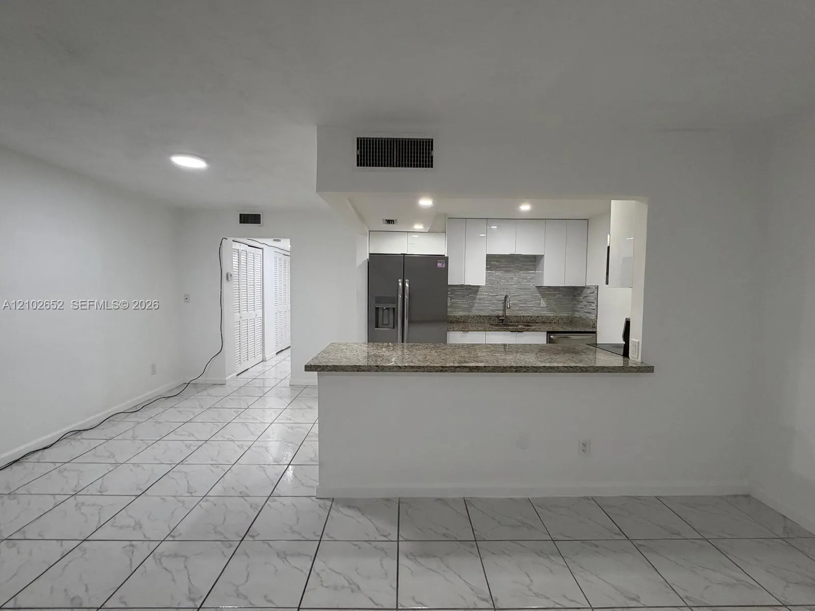 View details of listing 1855 NE 121st Street 18, North Miami, FL 33181 North Miami with MLS#