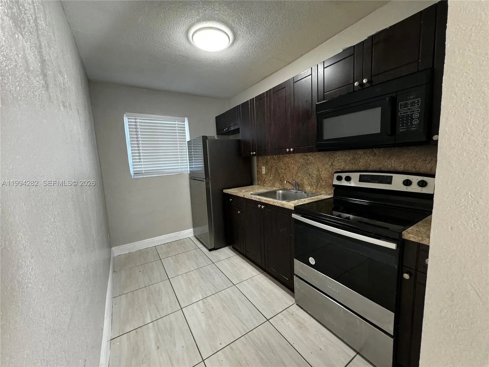 View details of listing 1940 Washington Avenue 11, Opa-Locka, FL 33054 Opa-Locka with MLS#