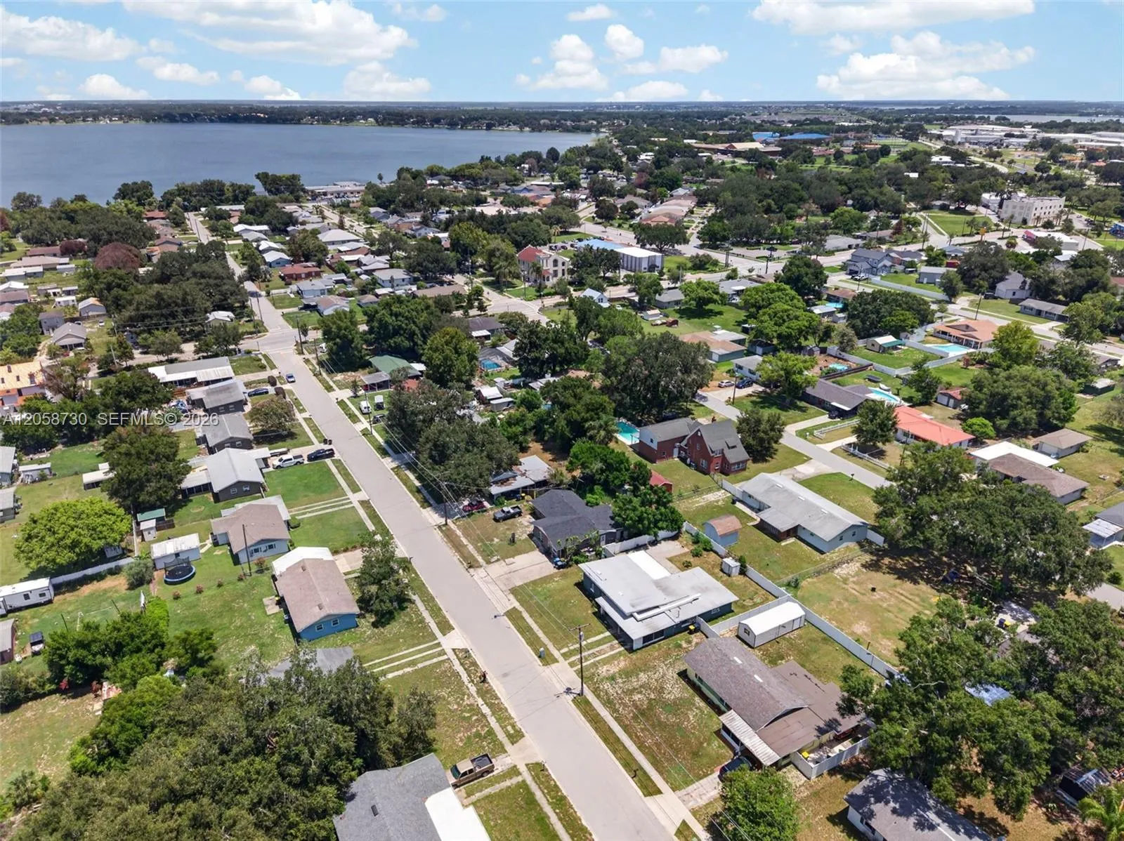 View details of listing 215 Palm Avenue, FL 33823  with MLS# 