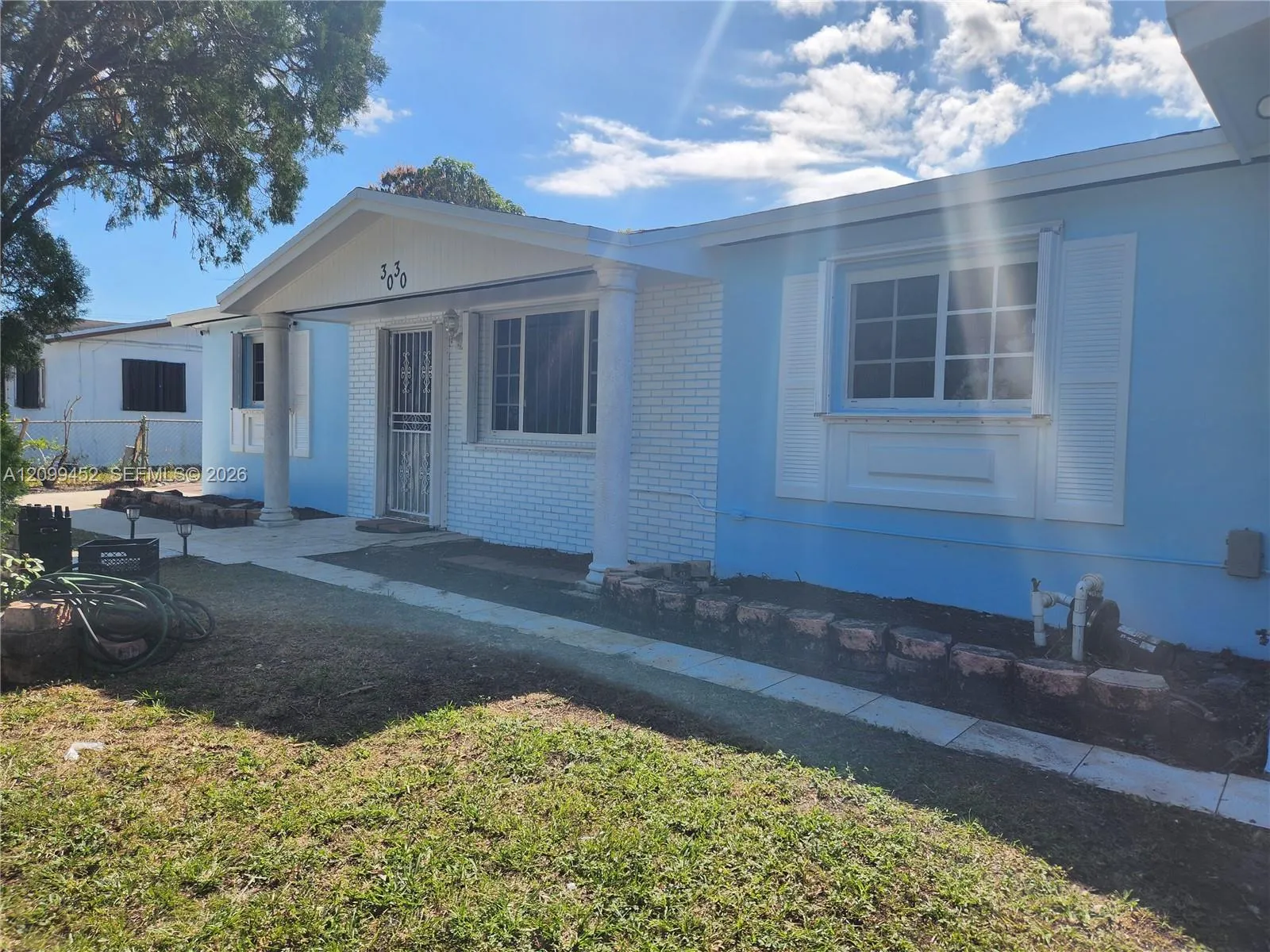 View details of listing 3030 NW 212th Street, Miami Gardens, FL 33056 Miami Gardens with MLS#