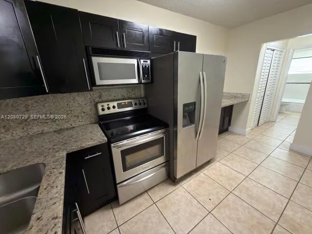 View details of listing 380 E 35th Street 9, Hialeah, FL 33013 Hialeah with MLS# 