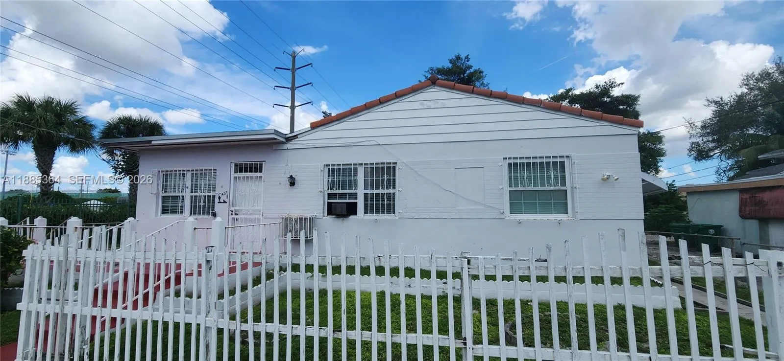 View details of listing 405 NW 64th Street, Miami, FL 33150 Miami with MLS#
