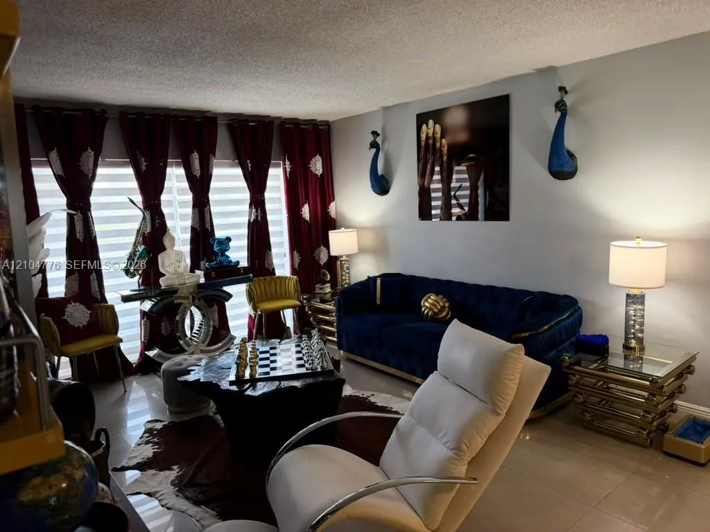 View details of listing 4800 NW 79th Avenue 202, Doral, FL 33166 Doral with MLS#