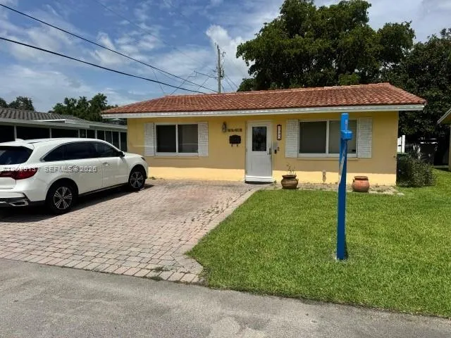 View details of listing 5403 NW 27th Avenue, Tamarac, FL 33309 Tamarac with MLS#