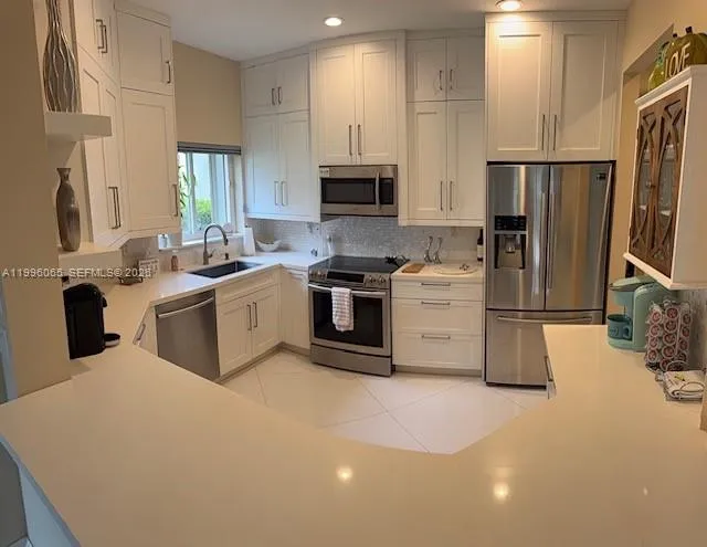 View details of listing 5656 NW 127th Terrace 5656, Parkland, FL 33076 Parkland with MLS#