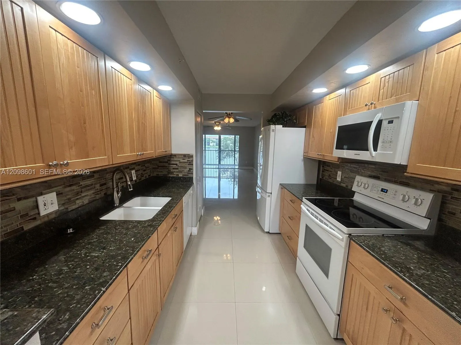 View details of listing 571 SW 141st Avenue 212N, Pembroke Pines, FL 33027 Pembroke Pines with MLS#