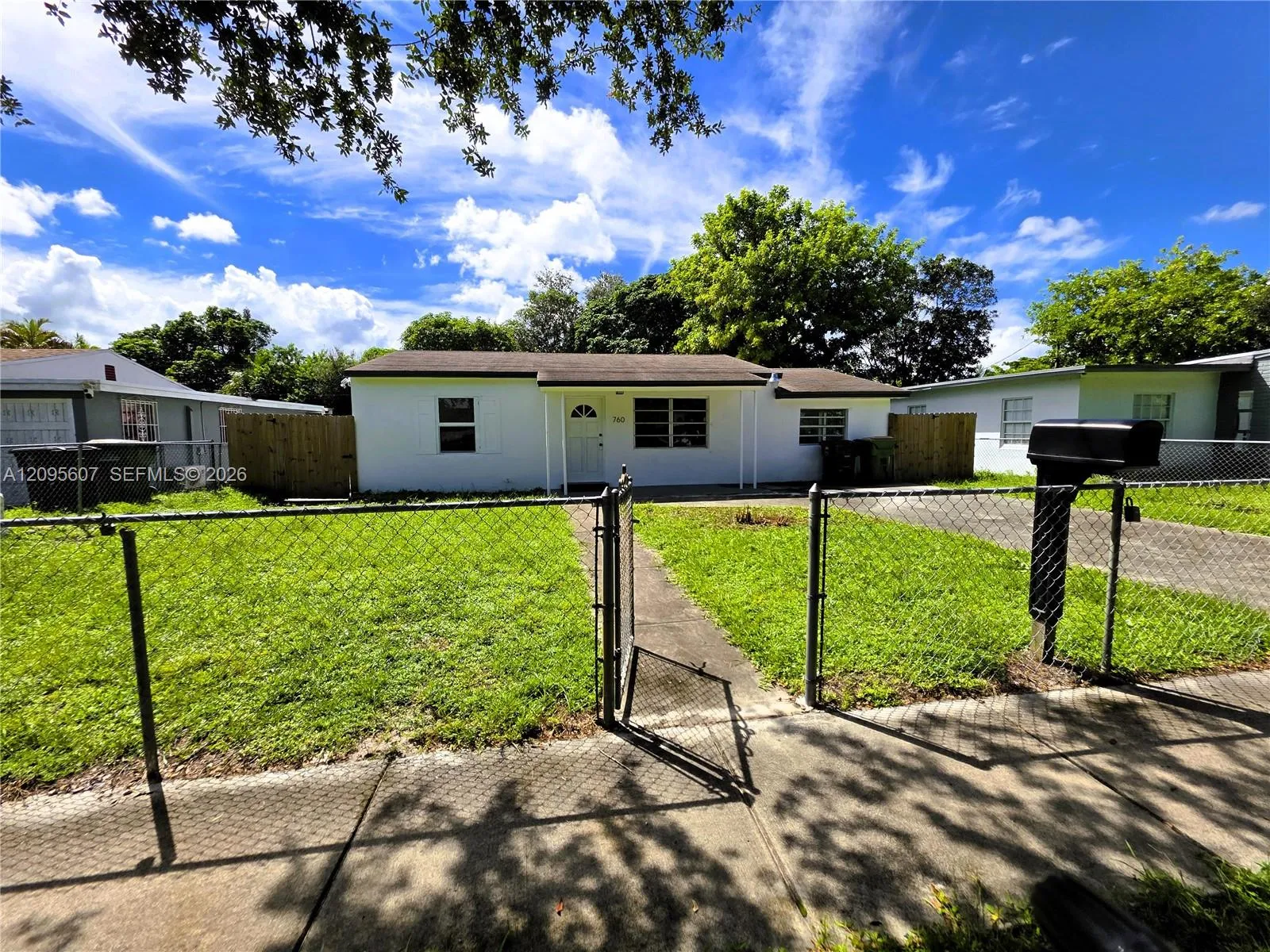 View details of listing 760 NW 126th Street, North Miami, FL 33168 North Miami with MLS#