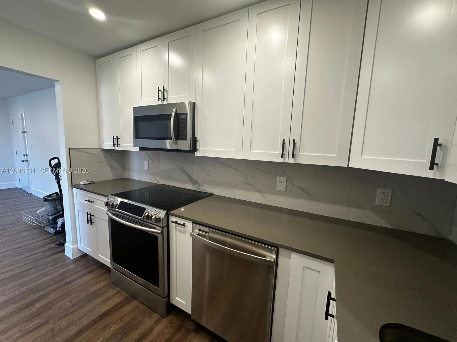 View details of listing 770 NE 128th Street 303, North Miami, FL 33161 North Miami with MLS#