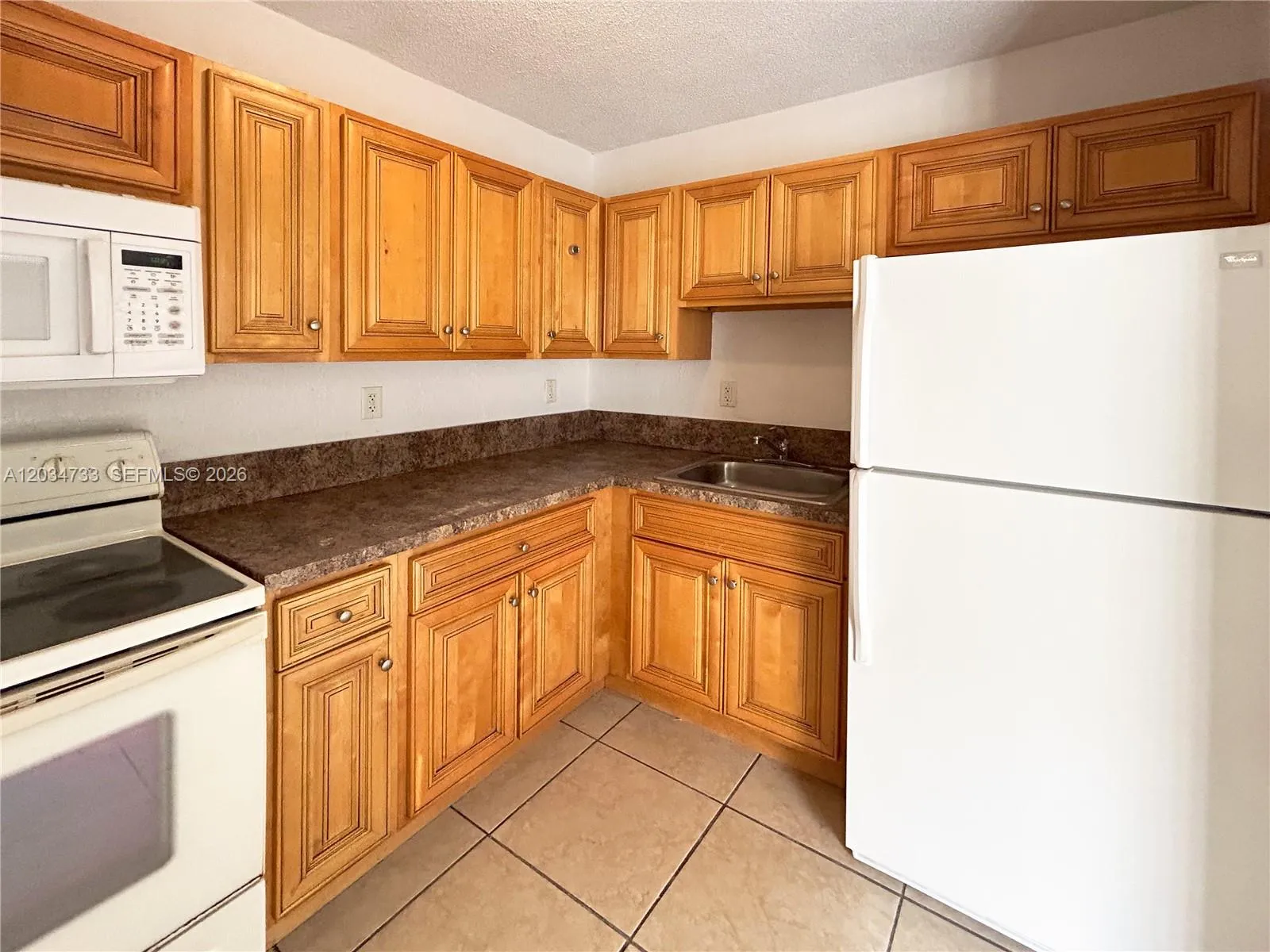 View details of listing 8287 NE Miami Court 102, Miami, FL 33138 Miami with MLS#
