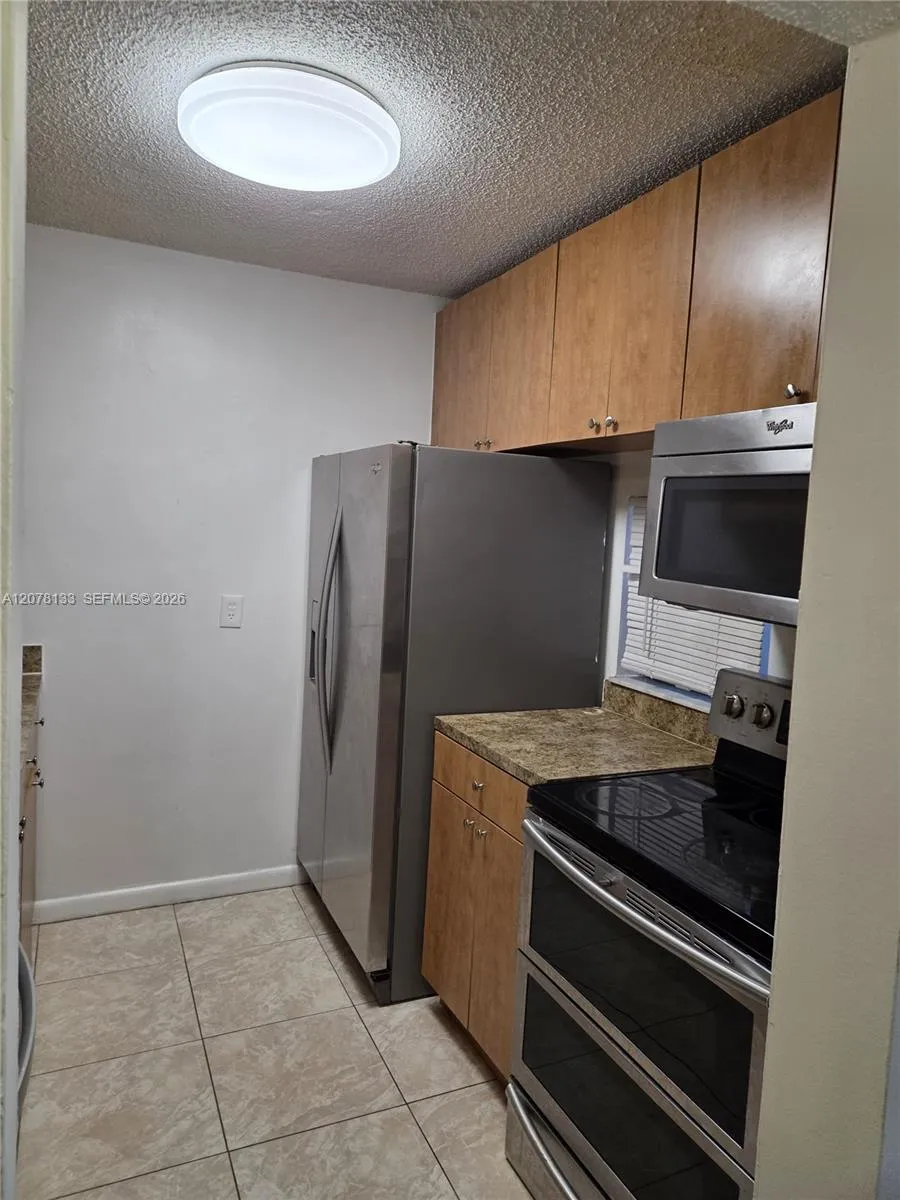 View details of listing 8550 N Sherman Circle 103, Miramar, FL 33025 Miramar with MLS#