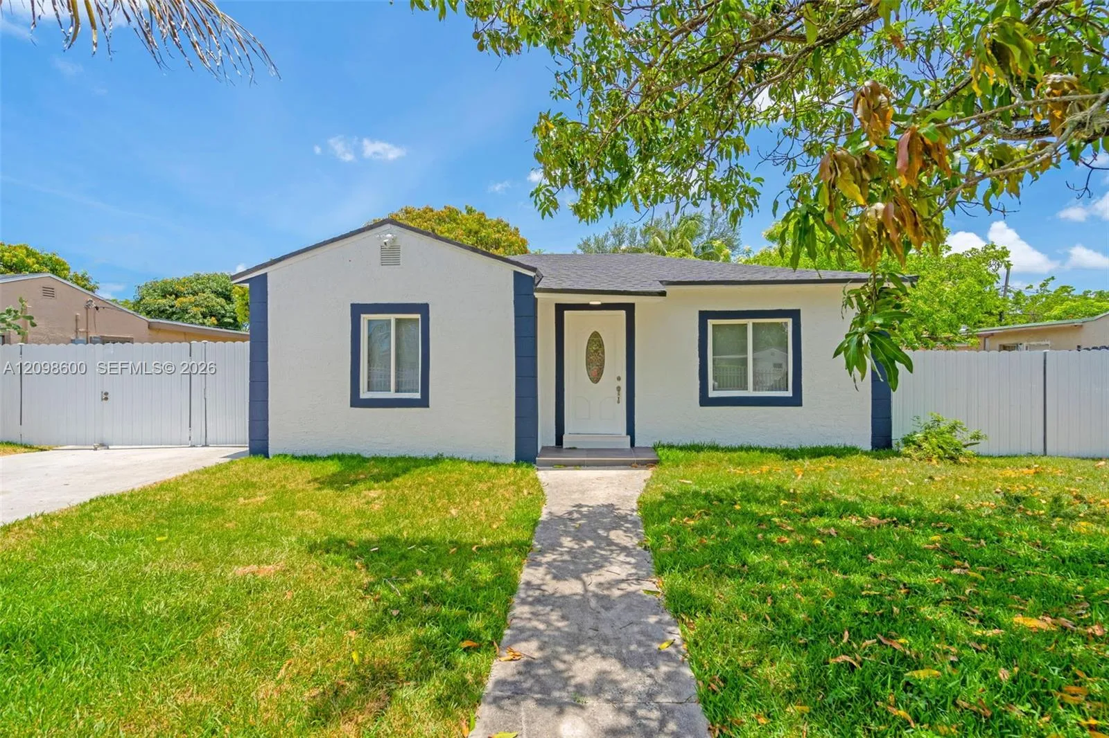 View details of listing 910 NW 123rd Street, North Miami, FL 33168 North Miami with MLS#