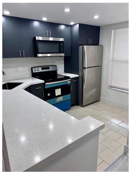 View details of listing 6001 NW 61st Avenue 102, Tamarac, FL 33319 Tamarac with MLS#