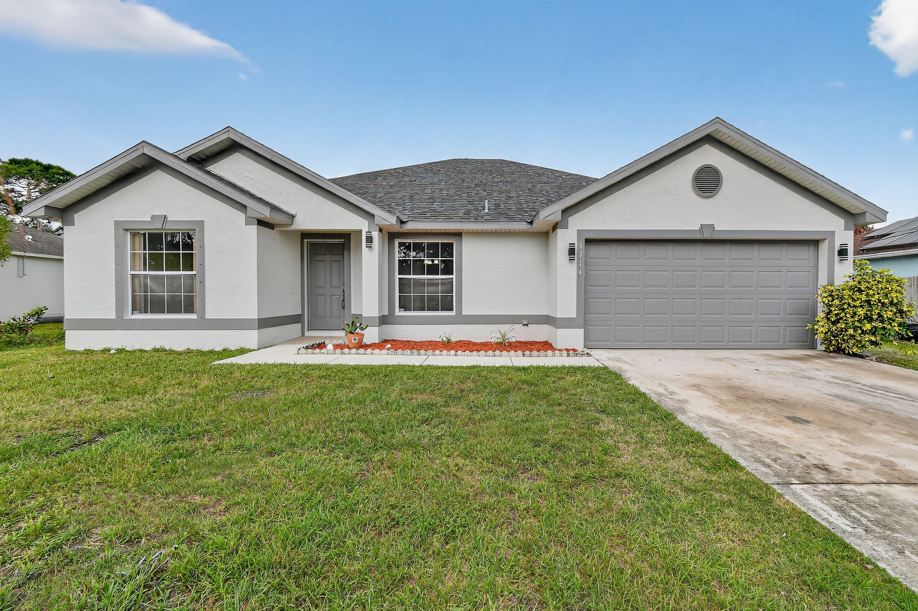 View details of listing 1714 SE Aneci Street, Port St. Lucie, FL 34983 Port St. Lucie with MLS#