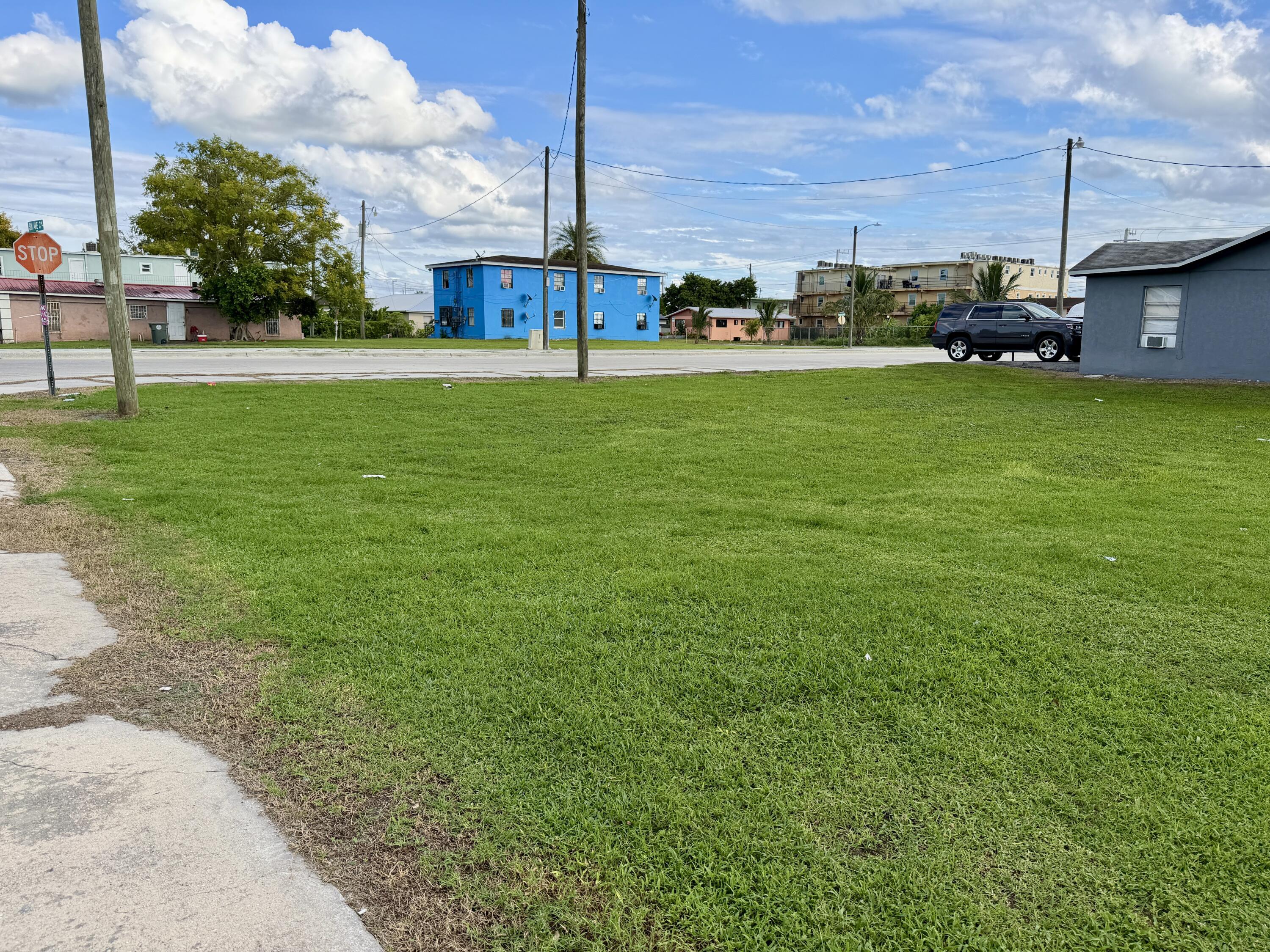 View details of listing 348 SW 8th Street, Belle Glade, FL 33430 Belle Glade with MLS#