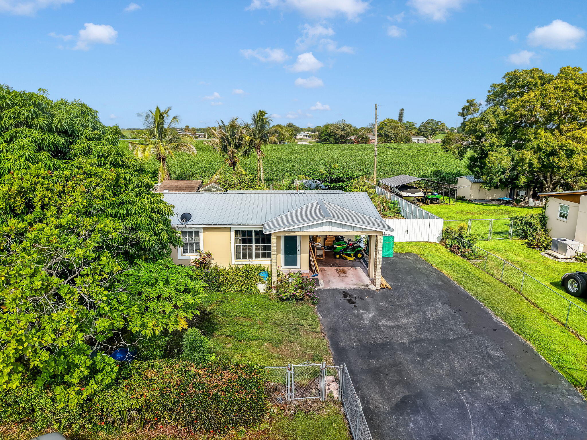 View details of listing 1048 WHITAKER Road, Belle Glade, FL 33430 Belle Glade with MLS#