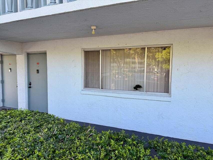 View details of listing 2000 Springdale Boulevard 102, Palm Springs, FL 33461 Palm Springs with MLS#