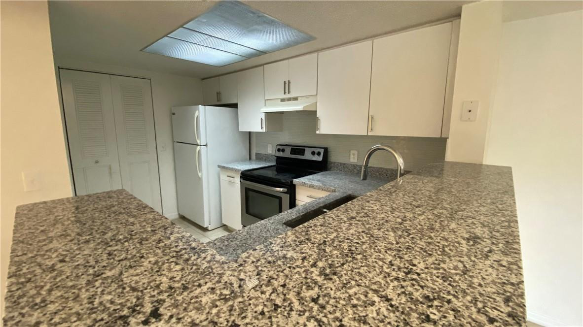View details of listing 5045 Wiles Road 205, Coconut Creek, FL 33073 Coconut Creek with MLS#