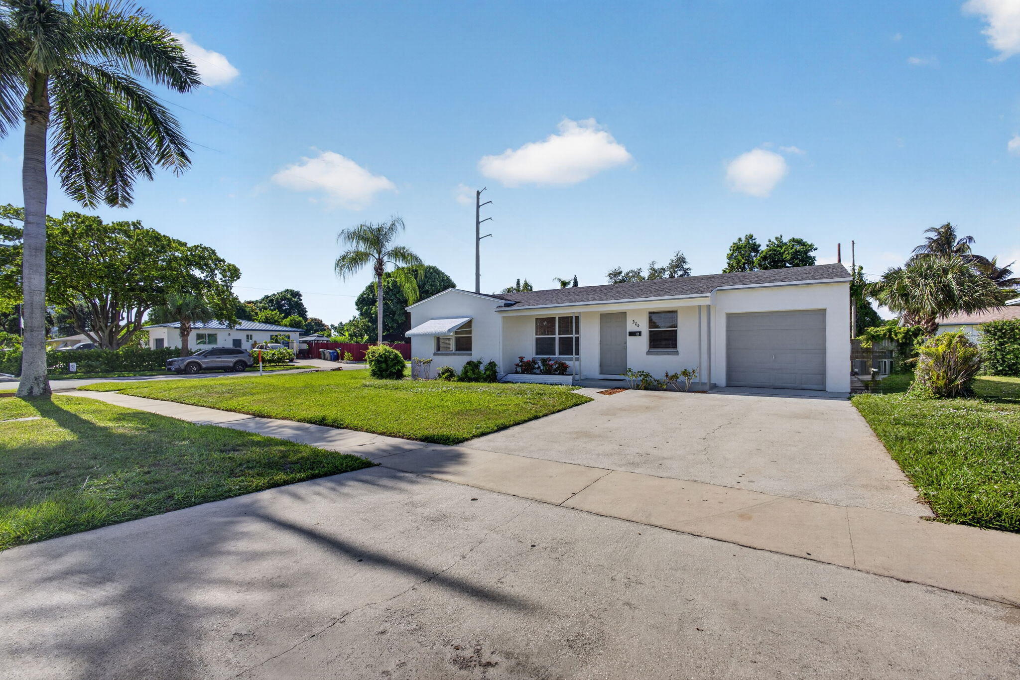 View details of listing 304 Cypress Drive, Lake Park, FL 33403 Lake Park with MLS#