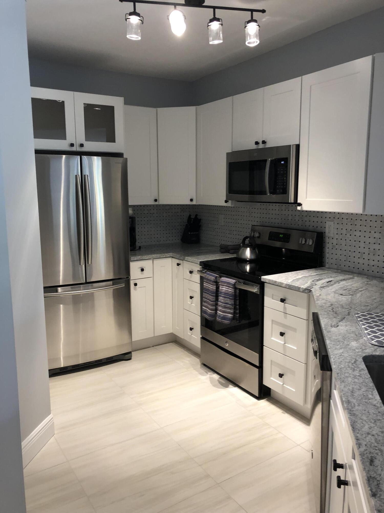 View details of listing 800 Uno Lago Drive 204, Juno Beach, FL 33408 Juno Beach with MLS# 