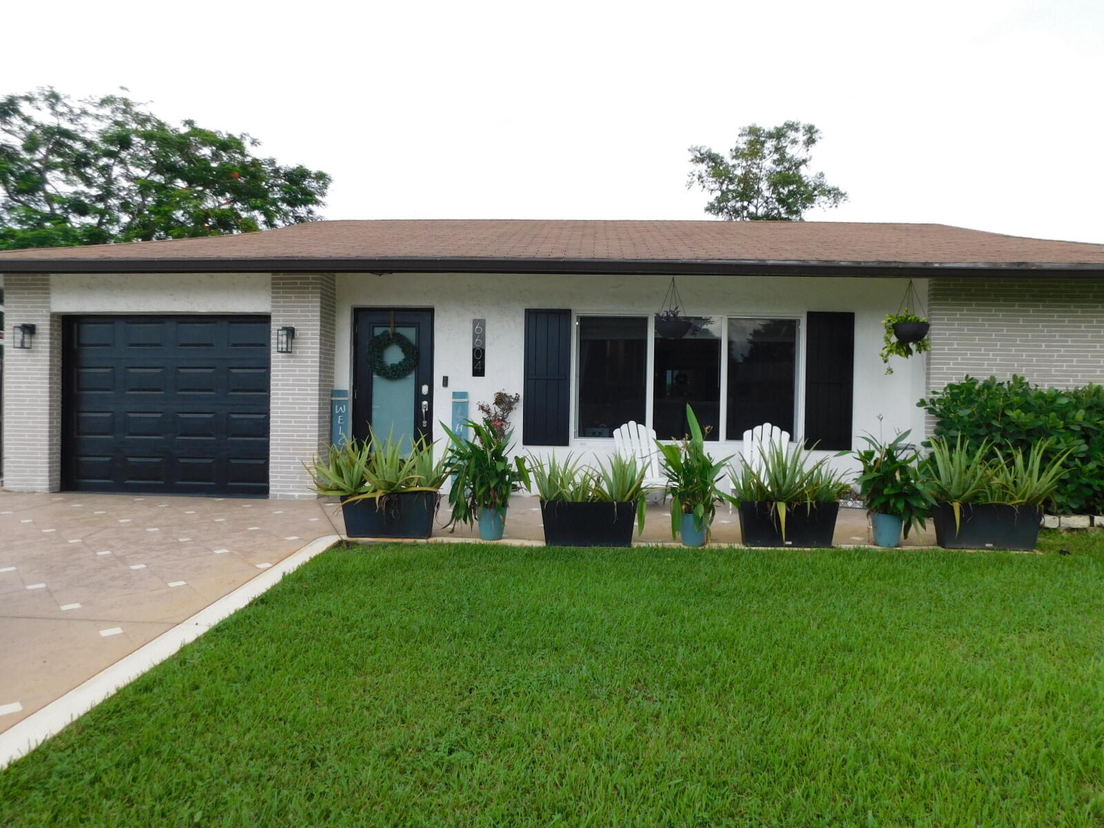 View details of listing 6604 NW 93RD Avenue, Tamarac, FL 33321 Tamarac with MLS#