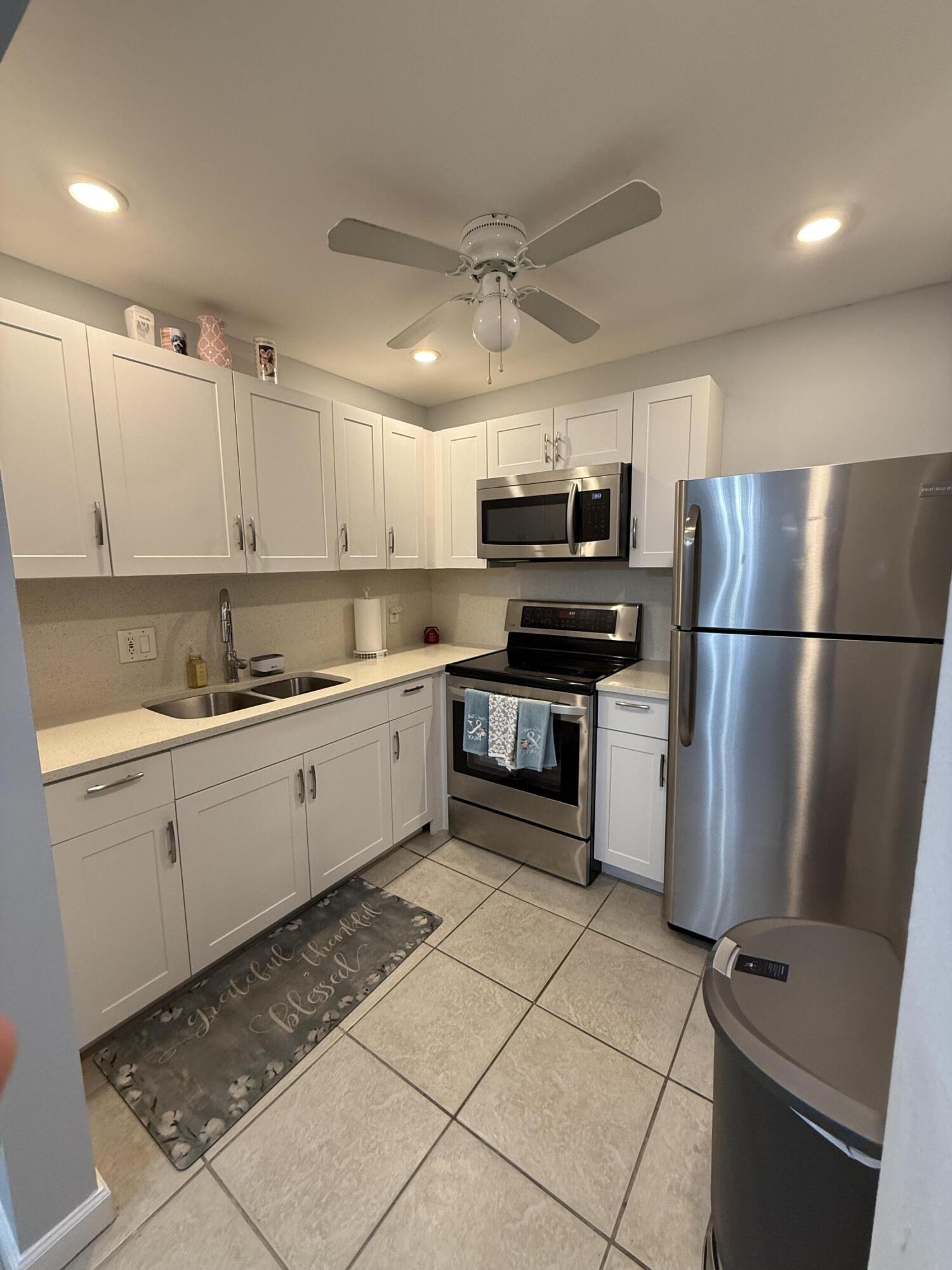 View details of listing 200 VILLAGE GREEN E 218, Palm Springs, FL 33461 Palm Springs with MLS#