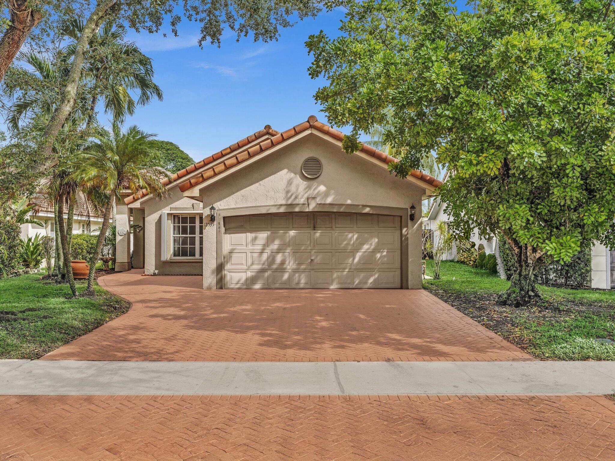 View details of listing 12535 SW 7th Place, Davie, FL 33325 Davie with MLS# 