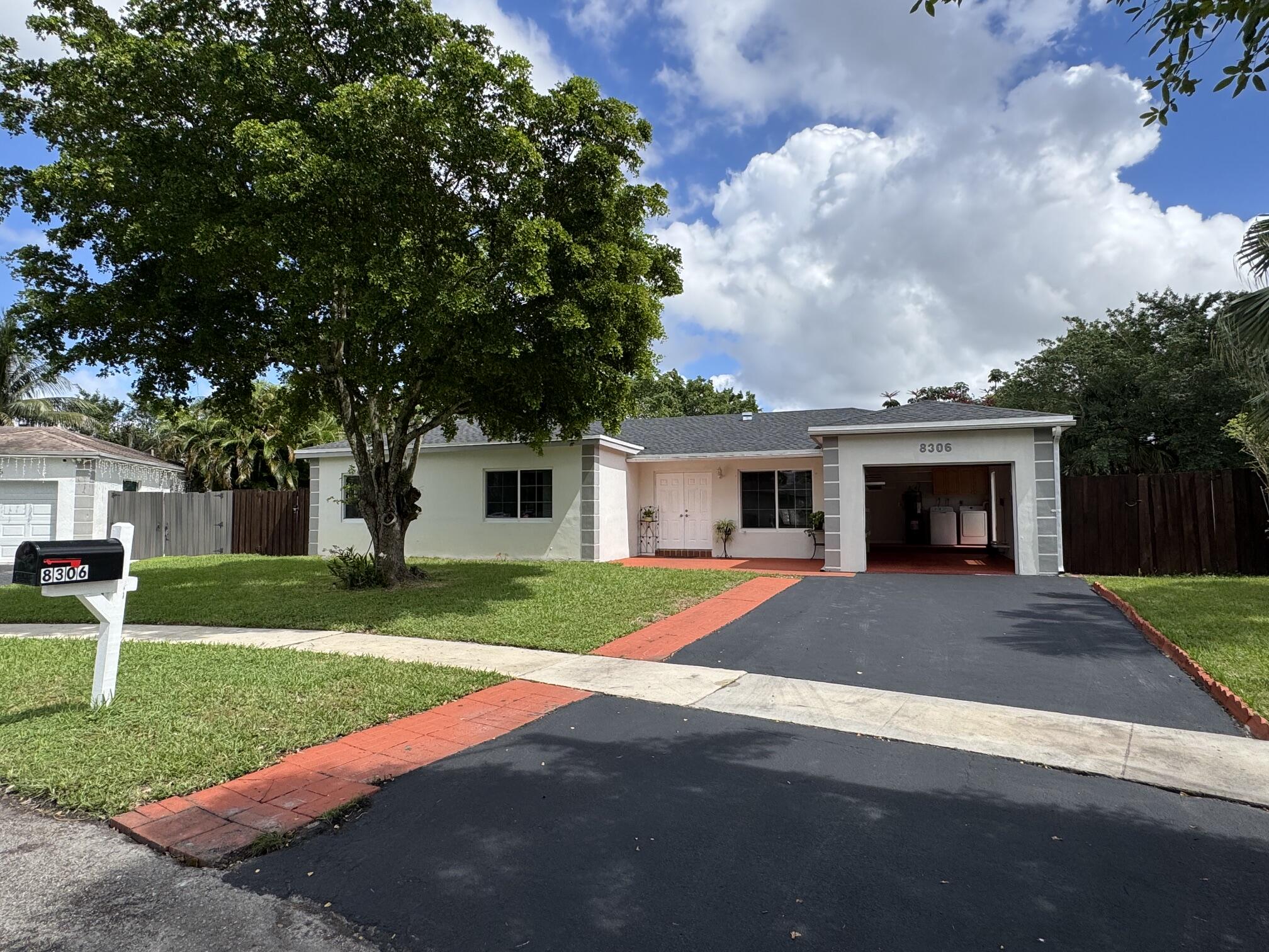 View details of listing 8306 NW 74TH Terrace, Tamarac, FL 33321 Tamarac with MLS#