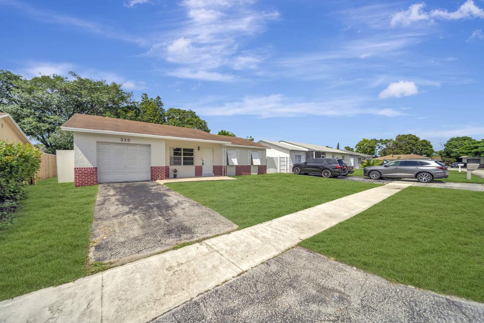View details of listing 310 SW 78TH Terrace, North Lauderdale, FL 33068 North Lauderdale with MLS#