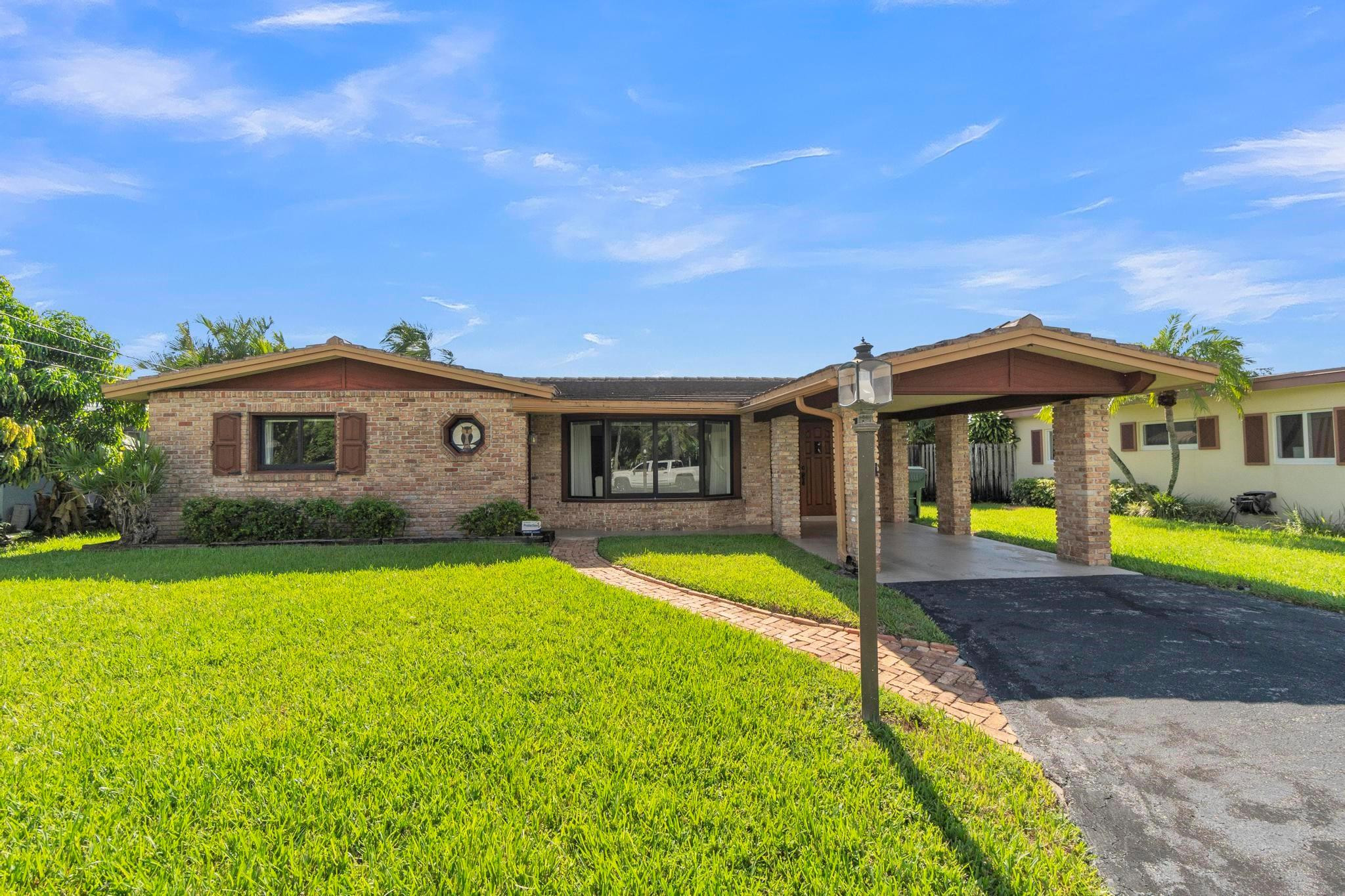 View details of listing 1774 NW 39th Place, Oakland Park, FL 33309 Oakland Park with MLS#