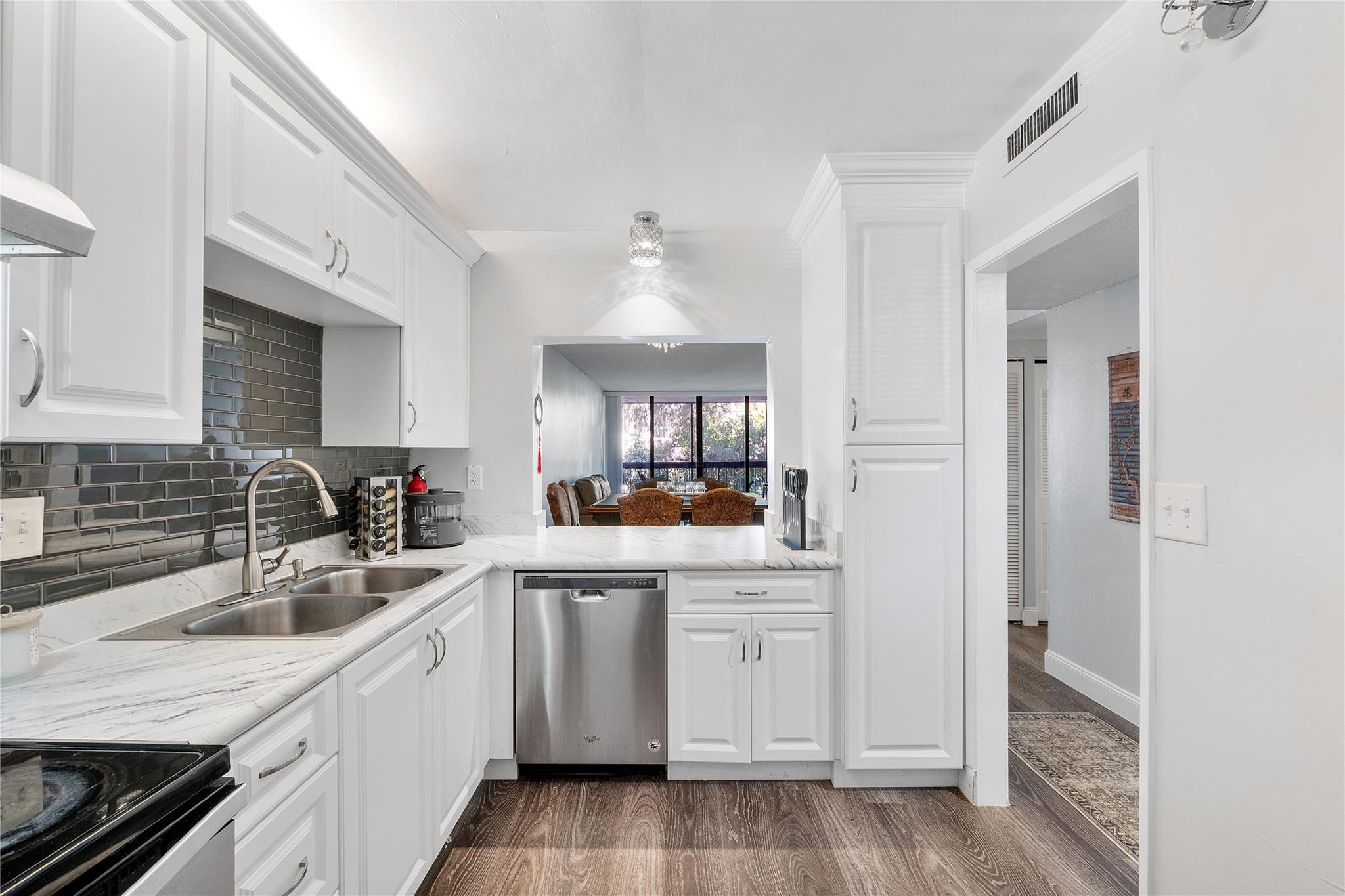 View details of listing 8437 Forest Hills Drive 203, Coral Springs, FL 33065 Coral Springs with MLS#