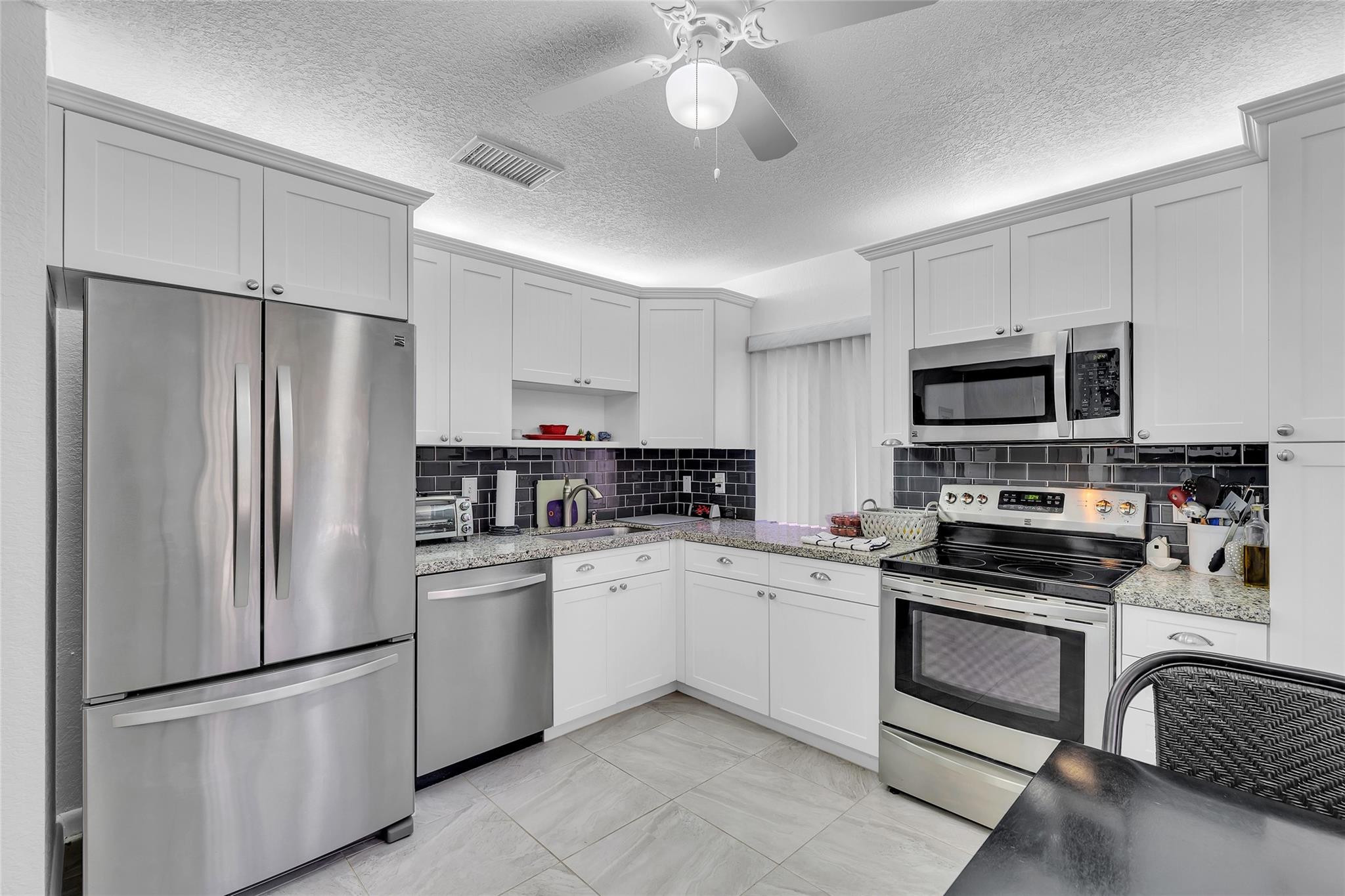 View details of listing 2260 Seagrape Circle, Coconut Creek, FL 33066 Coconut Creek with MLS#