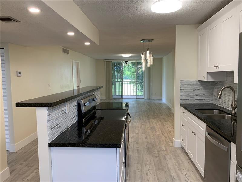 View details of listing 250 Jacaranda Drive 203, Plantation, FL 33324 Plantation with MLS#