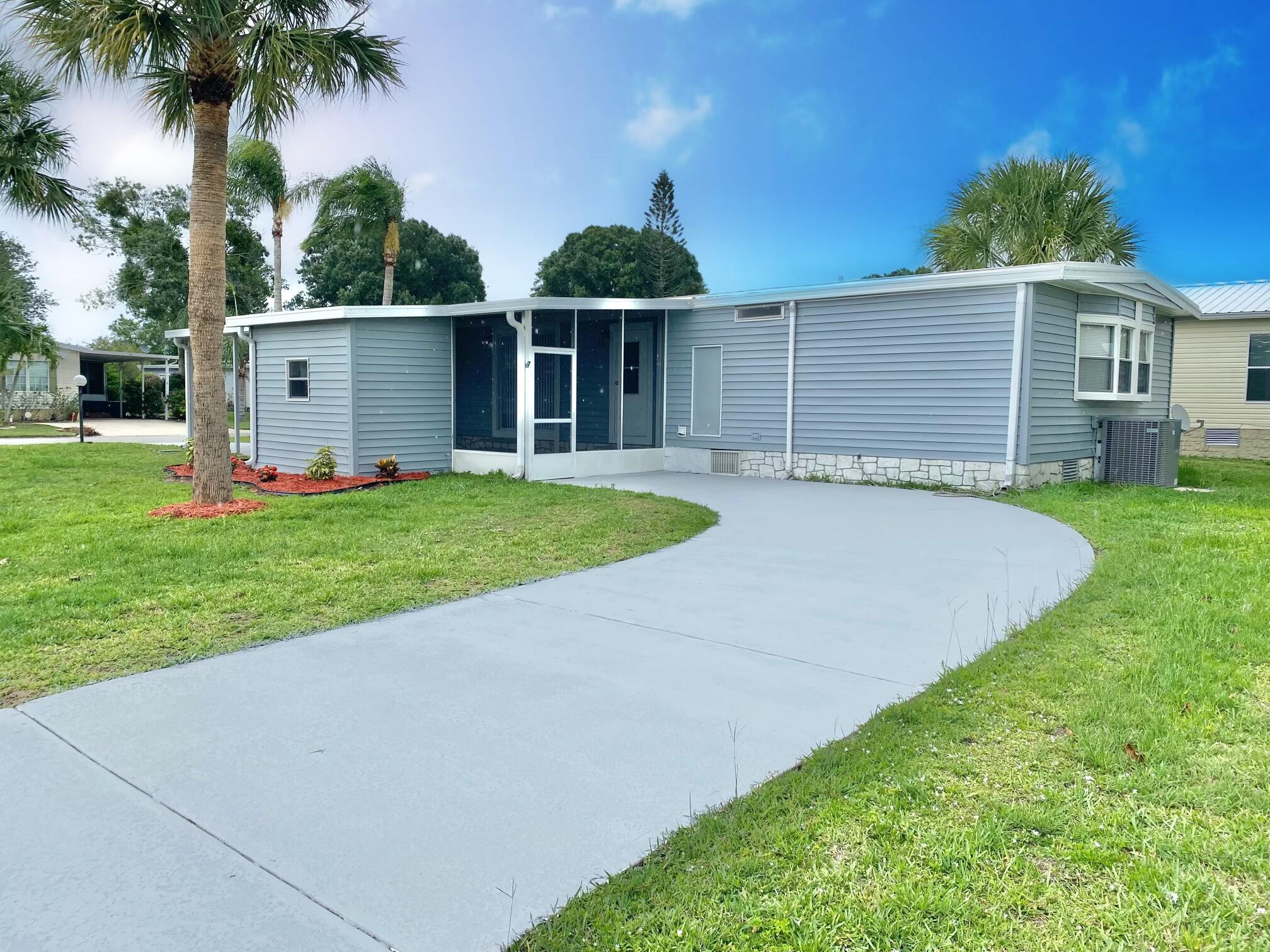View details of listing 1038 Warbler Court, Barefoot Bay, FL 32976 Barefoot Bay with MLS#