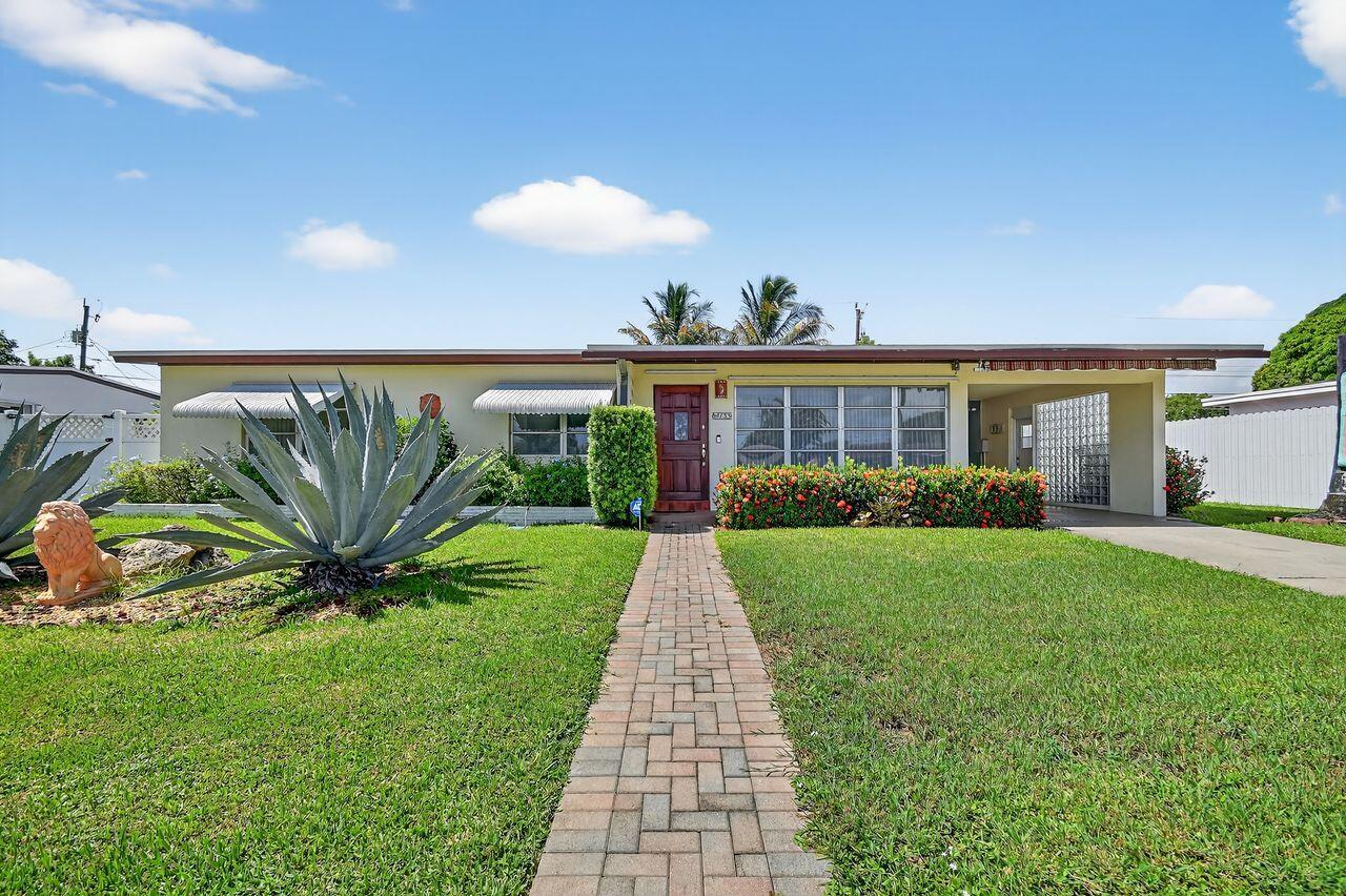 View details of listing 133 Greenbrier Drive, Palm Springs, FL 33461 Palm Springs with MLS#