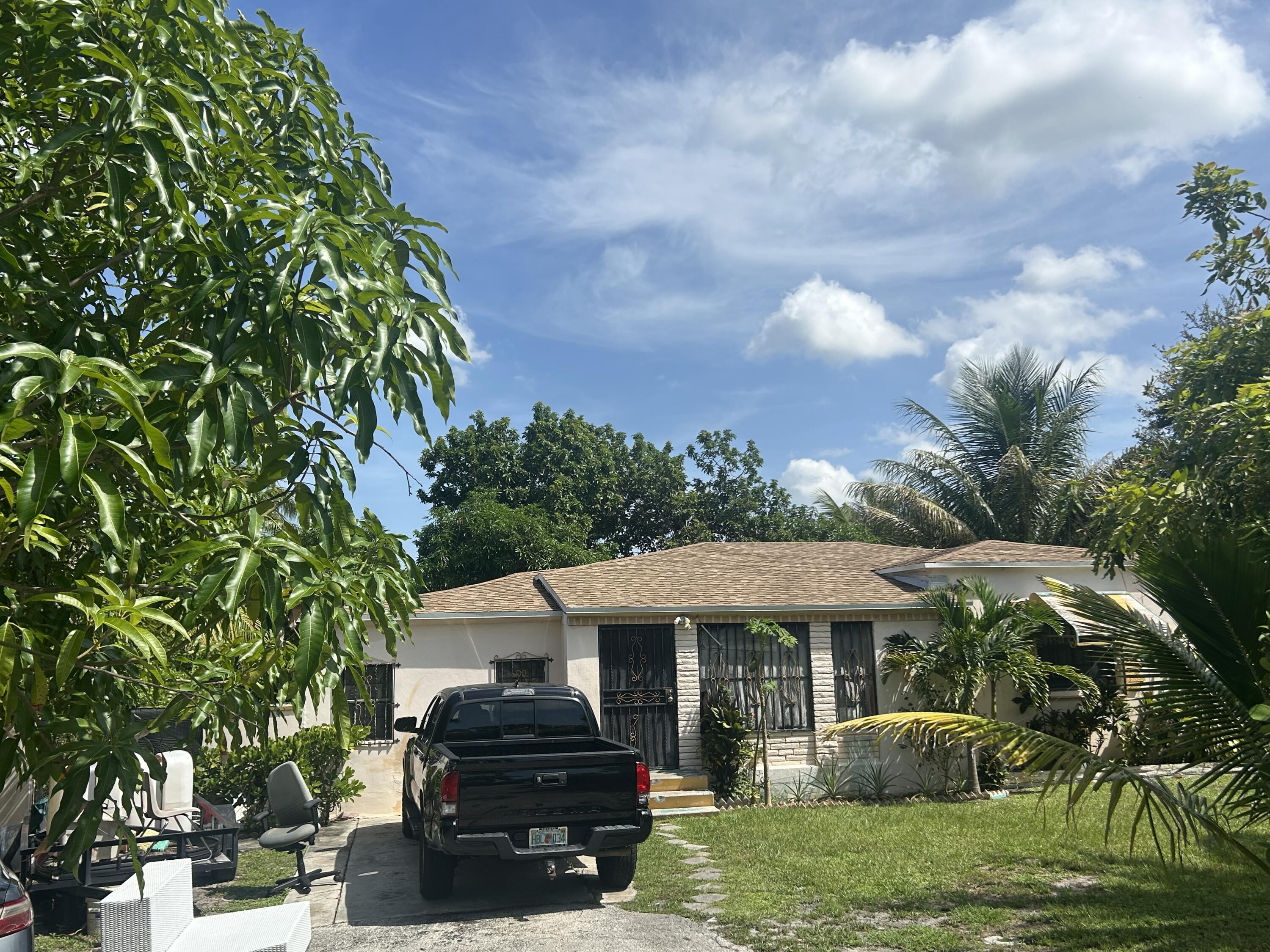 View details of listing 565 NW 143rd Street, Miami, FL 33168 Miami with MLS#