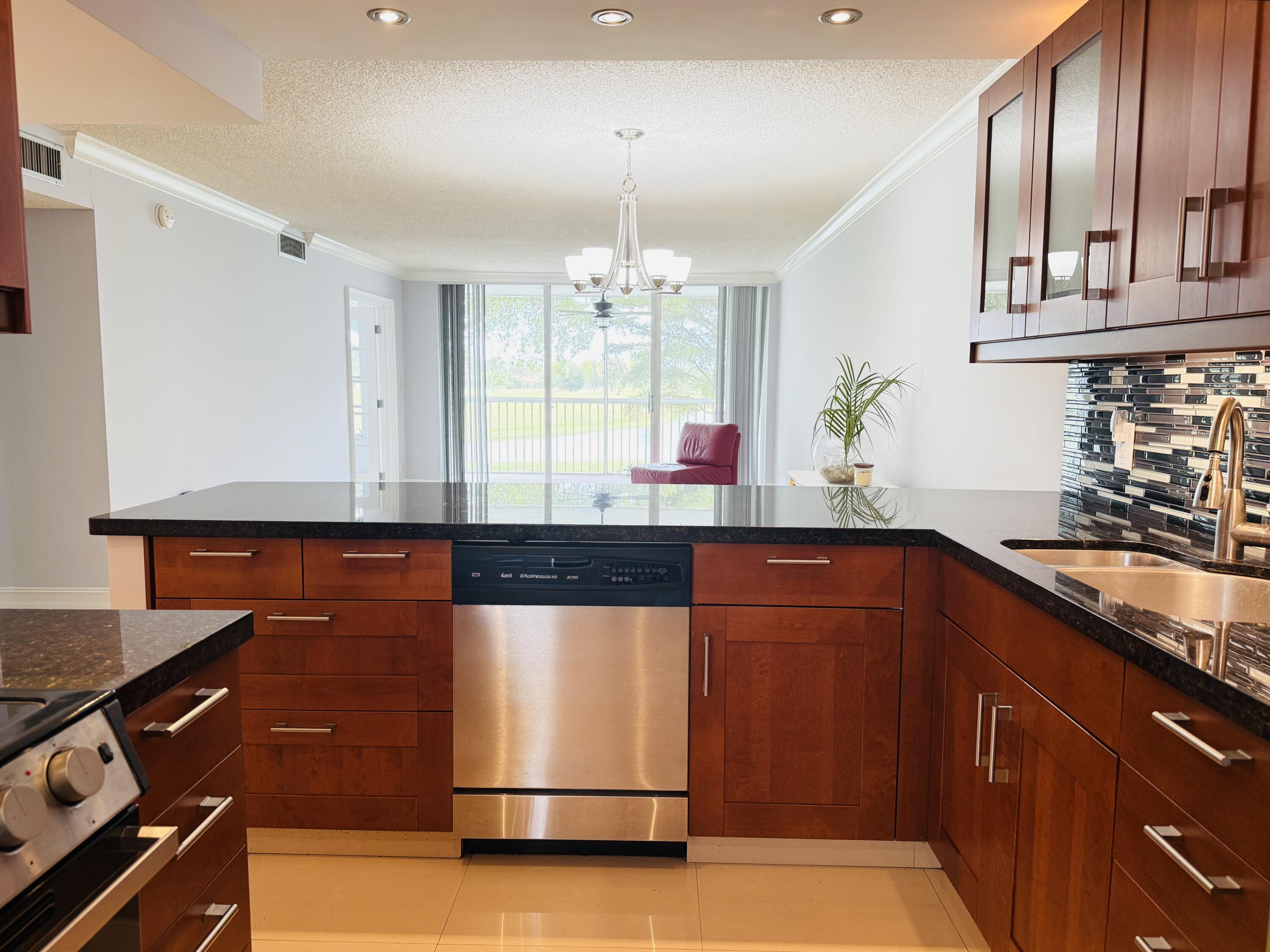 View details of listing 3080 N Course Drive 202, Pompano Beach, FL 33069 Pompano Beach with MLS#