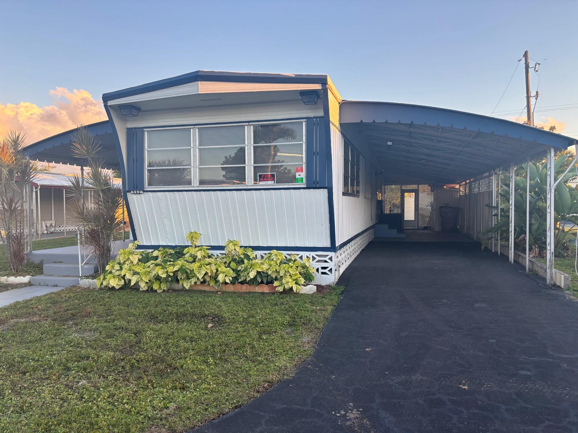 View details of listing 562 NE 47th St, Lot 393, Deerfield Beach, FL 33064 Deerfield Beach with MLS#