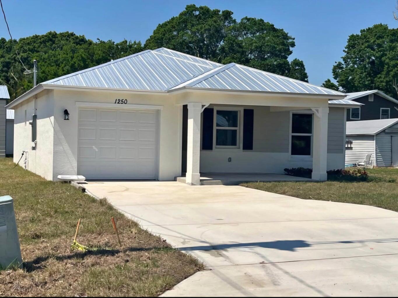 View details of listing 1250 NW Antoch Avenue, Stuart, FL 34994 Stuart with MLS# 